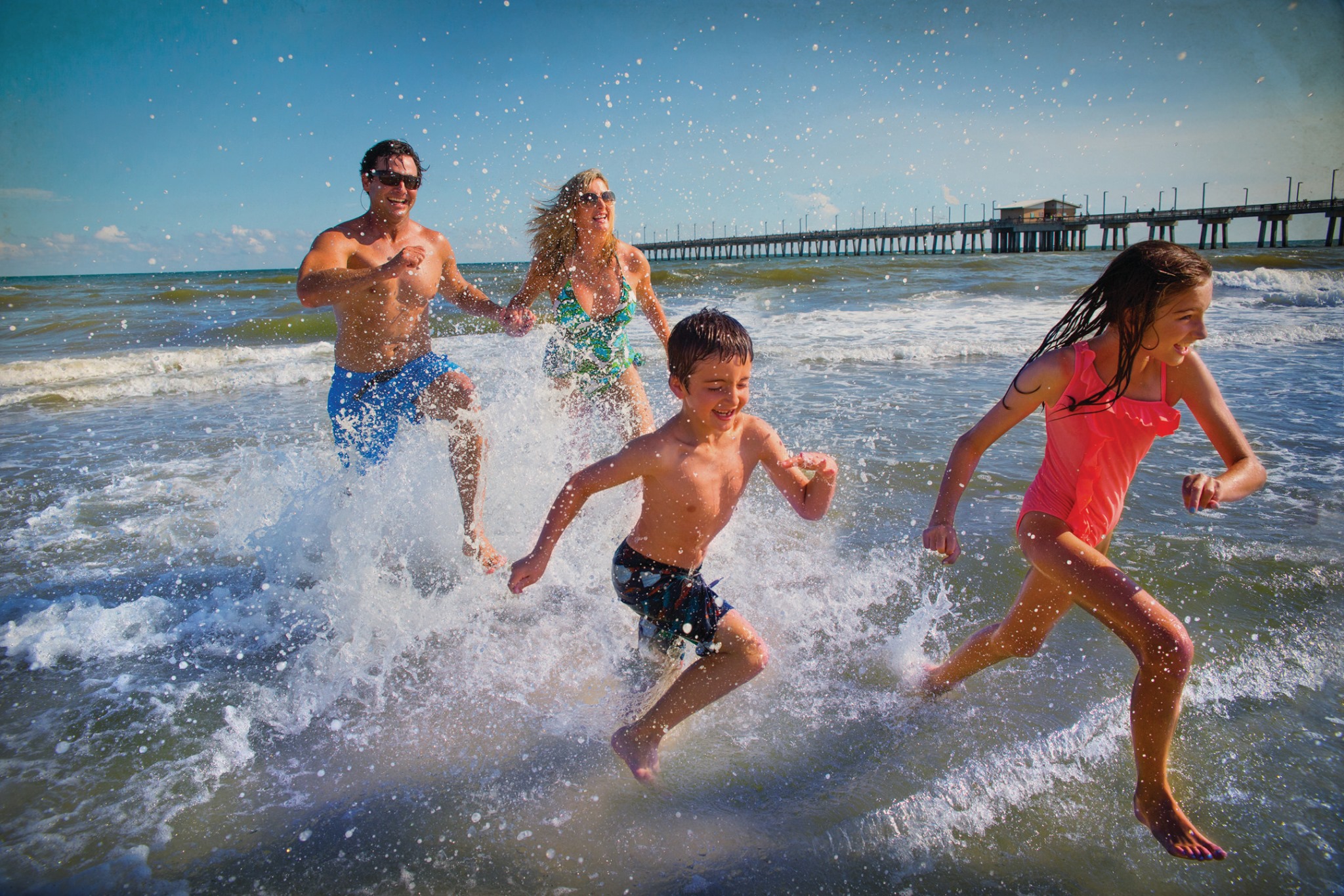 Família na praia no Alabama